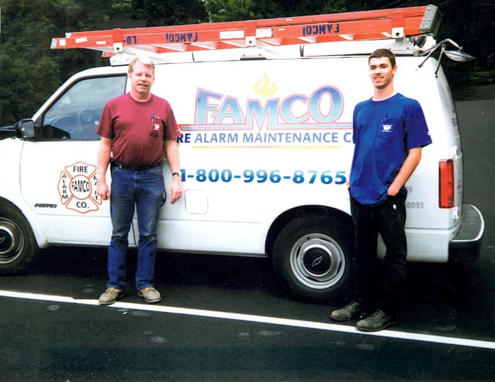 Ken and Dave Standing By Van